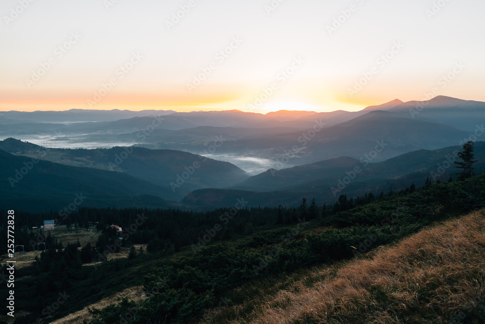 The beauty of sunrise in the mountains at a height.