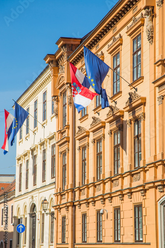Flags of the Republic of Croatia and European Union on historic buildings on St Mark's Square in Zagreb, Croatia