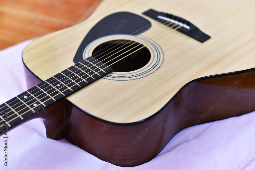 Obraz premium Acoustic guitar / Close up of guitar musical instrument tone vintage style classic
