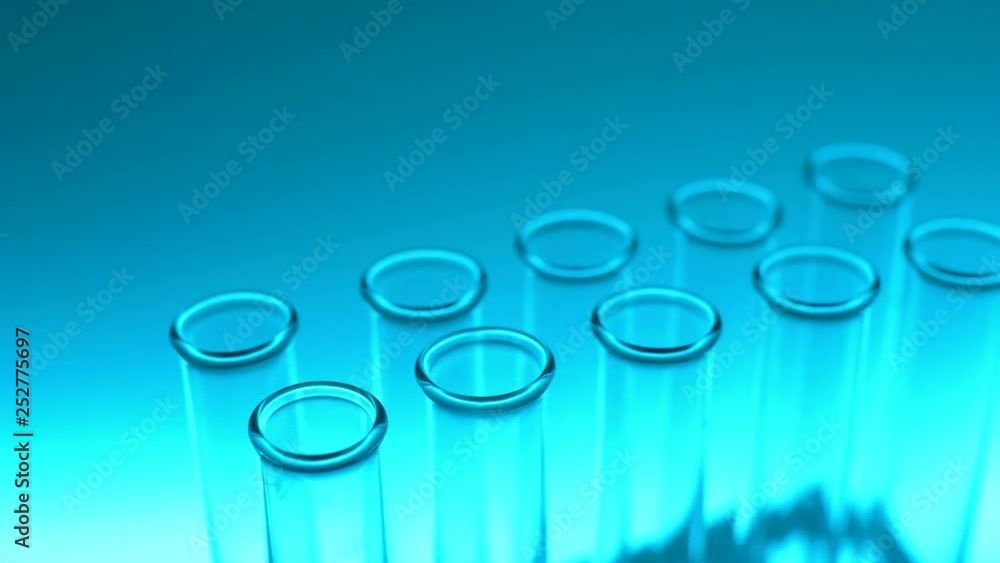 Glass test tubes in laboratory with turquoise light. Close up 4K footage. Glass test tubes in laboratory with turquoise light. Close up 4K footage.