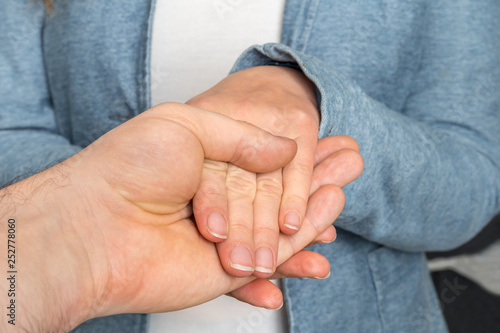 Hands touch each other - together, helping, sympathy concept