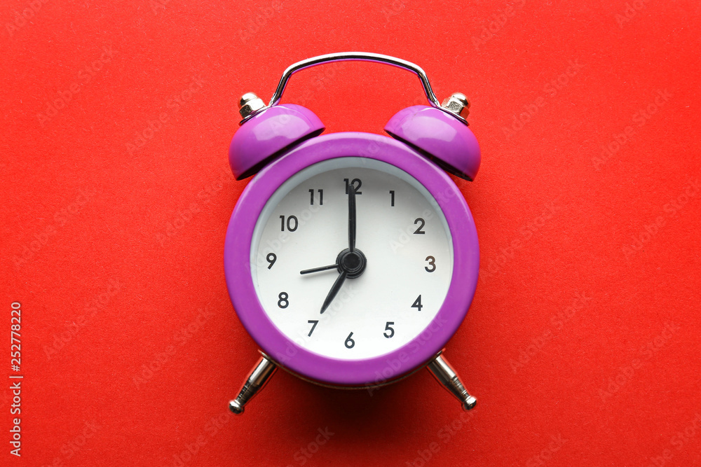 Alarm clock on color background Alarm clock on color background