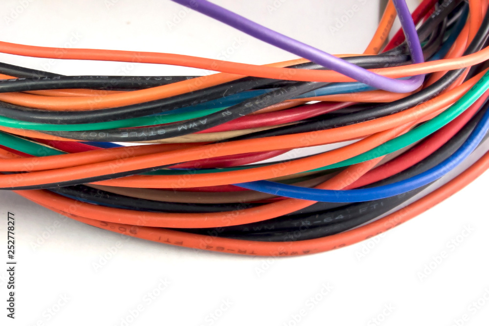 line multicolored wires on a white closeup line multicolored wires on a white closeup