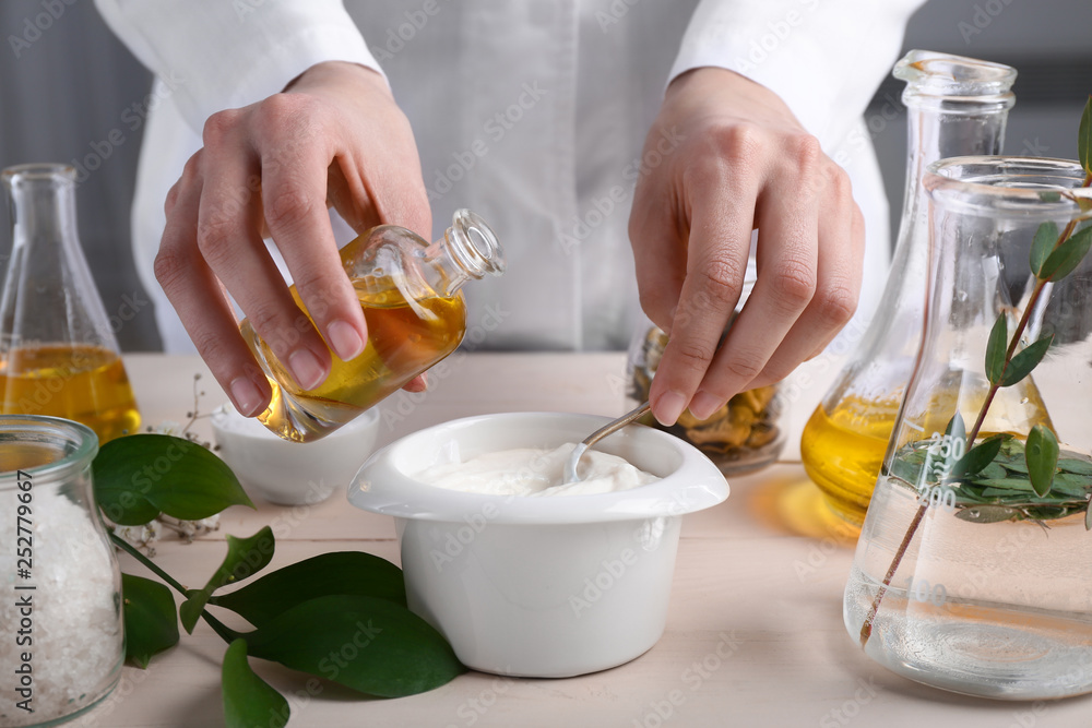 Woman preparing natural cosmetic, closeup Woman preparing natural cosmetic, closeup