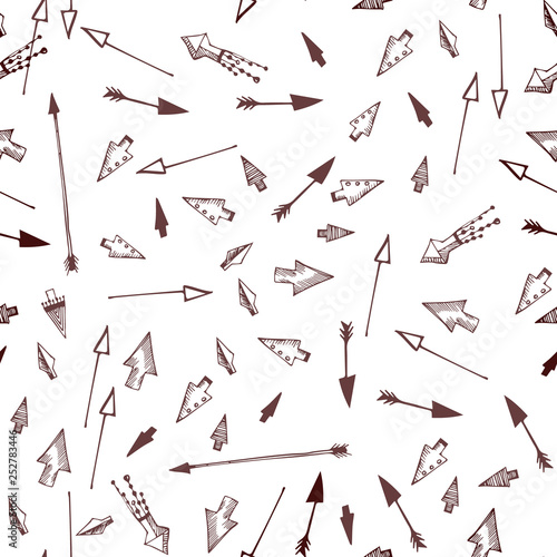 vector seamless pattern made with different sketchy arrows. printed goods.
