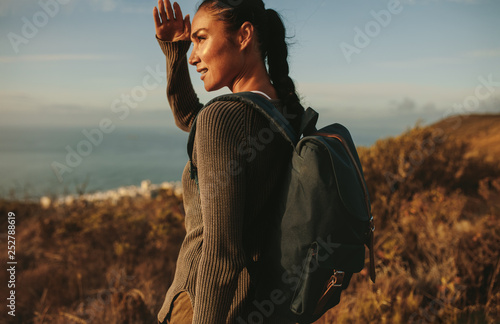 Female hiker admiring a view photo