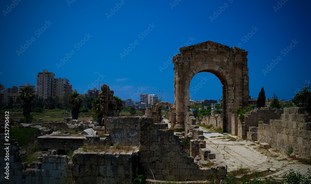 Remains of necropolis and Arch in ancient columns excavation site in Tyre, Lebanon