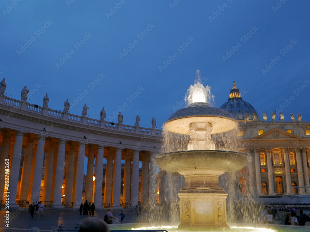close shot of a fountain in saint peter's square, the vatican