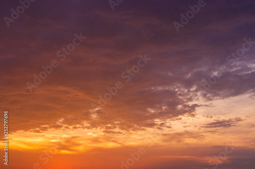 dramatic sunset with golden clouds © patipan