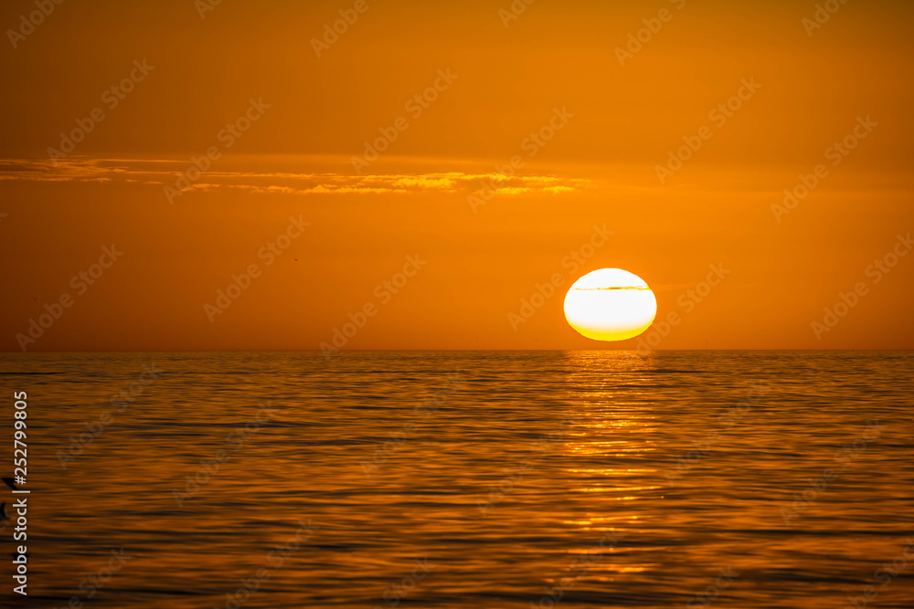 Beautiful sunset over the sea with clear sky in Anna Maria Island, Florida