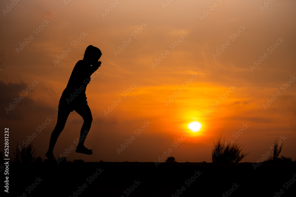 young fitness woman running on sunset seaside trail - Image