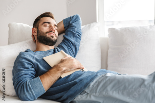 Attractive young man relaxing