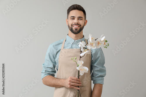 Handsome male florist on li...