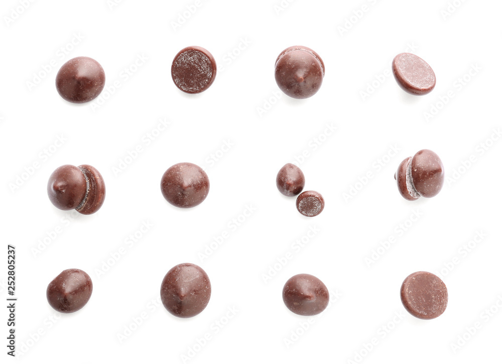 Delicious chocolate chips on white background Delicious chocolate chips on white background