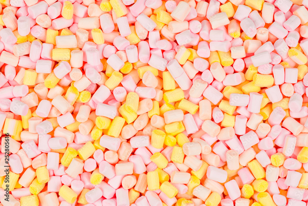 Marshmallow. Background of pink and yellow colorful mini marshmallows. Marshmallow. Background of pink and yellow colorful mini marshmallows.
