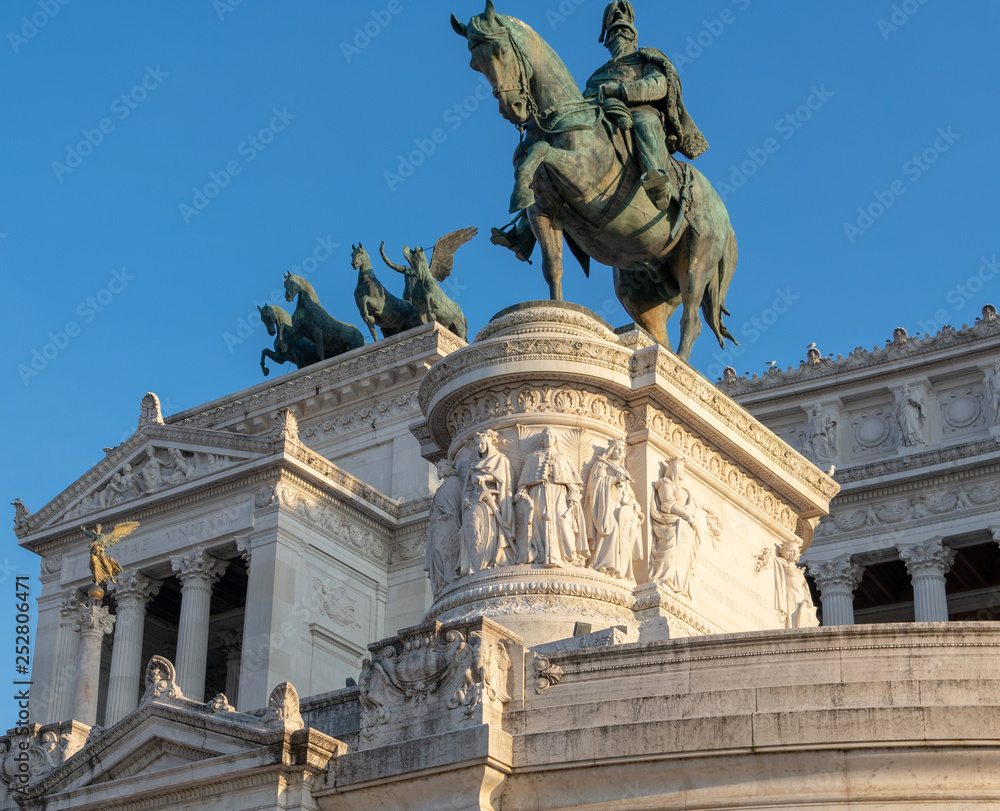 Rome/Italy 21 february 2019 :piazza venezia in rome statues people and lanmark buildings in a sunny day