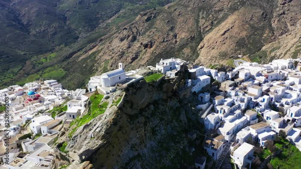Aerial drone panoramic video of picturesque main village or chora of Serifos island with breathtaking views to the Aegean sea in spring, Cyclades islands, Greece Aerial drone panoramic video of picturesque main village or chora of Serifos island with breathtaking views to the Aegean sea in spring, Cyclades islands, Greece