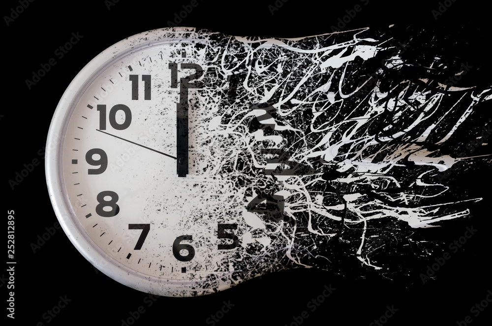 Time is running out concept shows clock that is dissolving away into little particles. Black and