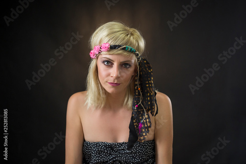portrait of beautiful young woman wearing hippie headband