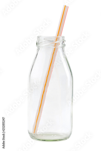 Glass bottle with a straw