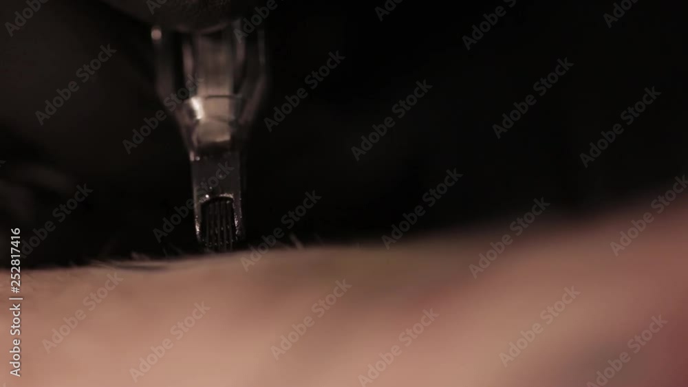 Close-up of a tattoo machine. Paint application Close-up of a tattoo machine. Paint application