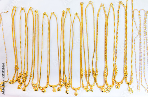 many design of gold necklace isolated on white