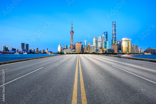 Empty asphalt road through Shanghai business district