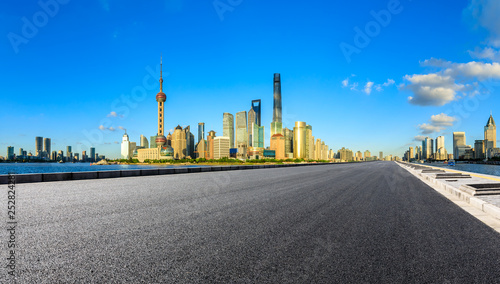 Empty asphalt road through Shanghai business district