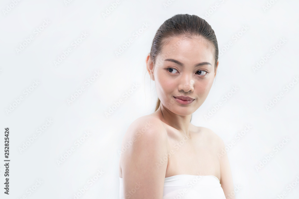 Beautiful Young Asian woman with clean fresh skin, natural make-up on white background, beauty skin concept Beautiful Young Asian woman with clean fresh skin, natural make-up on white background, beauty skin concept