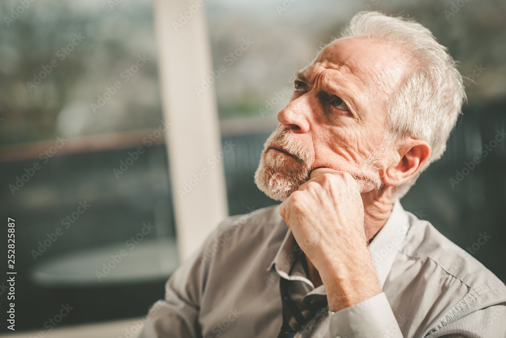 Thoughtful senior businessman Thoughtful senior businessman