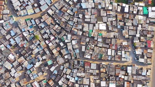 Straight down high aerial over ramshackle township of Gugulethu, one of the poverty stricken slums, ghetto, or townships of South Africa. photo