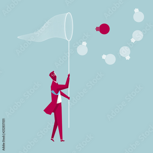Businessman holding a butterfly net. Capture the light bulb. The background is blue.
