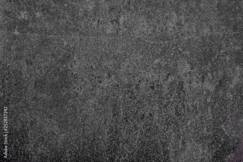 Dark grey stone detail texture – grainy industrial structure background for graphics 