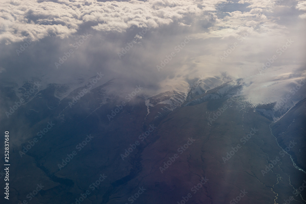Fototapeta premium Aerial view of fog and mountains