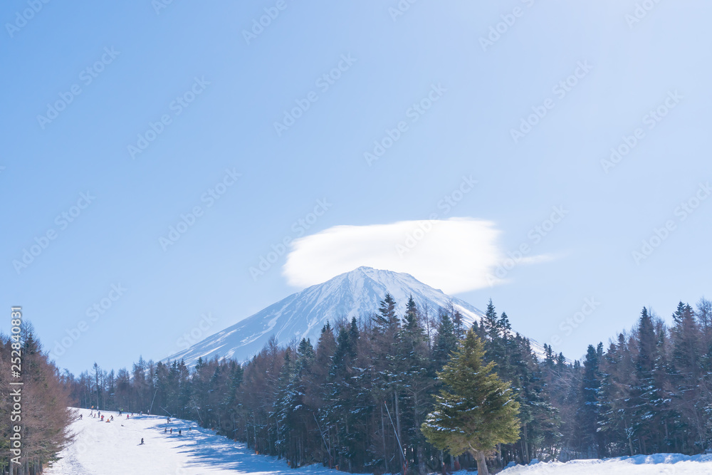 Mount Fuji, Fujiyama Top beautiful snow could for Japan beautiful landscape Highest point, view from sport ski resort valley with pine in sunny day, winter Fujisan for travel landmark in Tokyo.