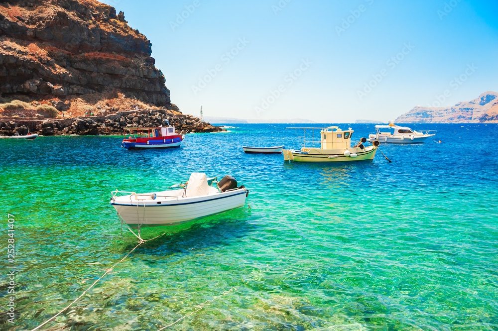 Fishing boats in the port of Santorini island, Greece.