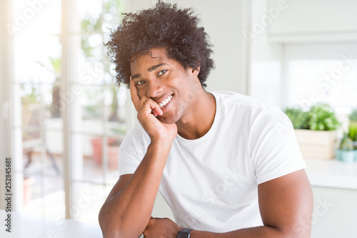 Handsome african american happy man smiling confident