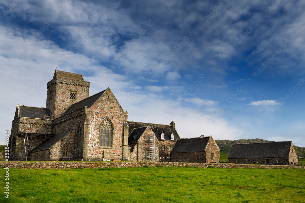 Restoration work at Iona Abbey monastery founded by St Columba bringing christianity to Scotland on Isle of Iona Inner Hebrides Scotland UK