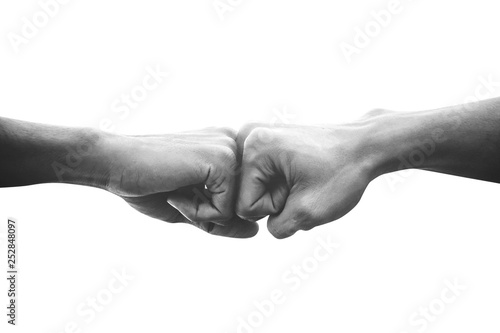Hands of man people fist bump team teamwork and partnership business success, Black and white image photo