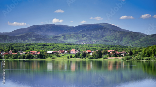 Landscape. Small town between the lake and the mountains.