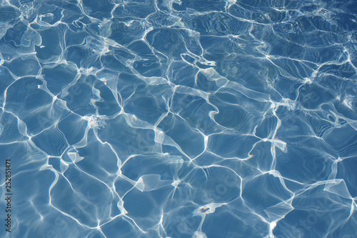 Surface of blue swimming pool texture background, Water in swimming pool.