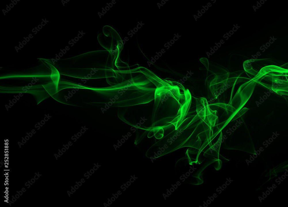 Green smoke on black background and darkness concept Green smoke on black background and darkness concept