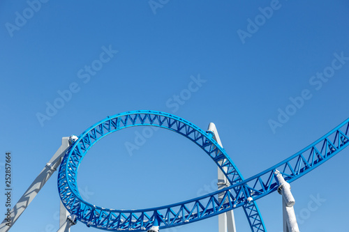 Fototapeta Naklejka Na Ścianę i Meble -  rollercoaster against blue sky