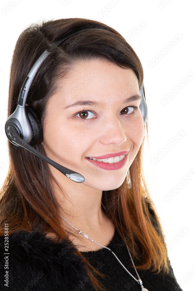Customer support operator working in a call center office Customer support operator working in a call center office