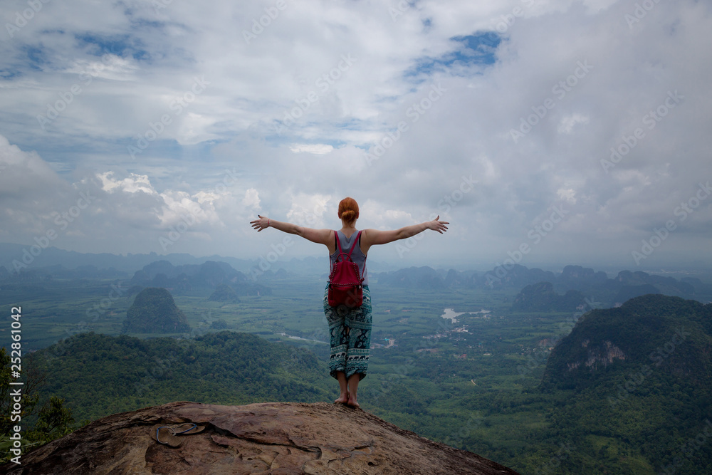 Girl enjoys a beautiful view, Krabi, Thailand Girl enjoys a beautiful view, Krabi, Thailand