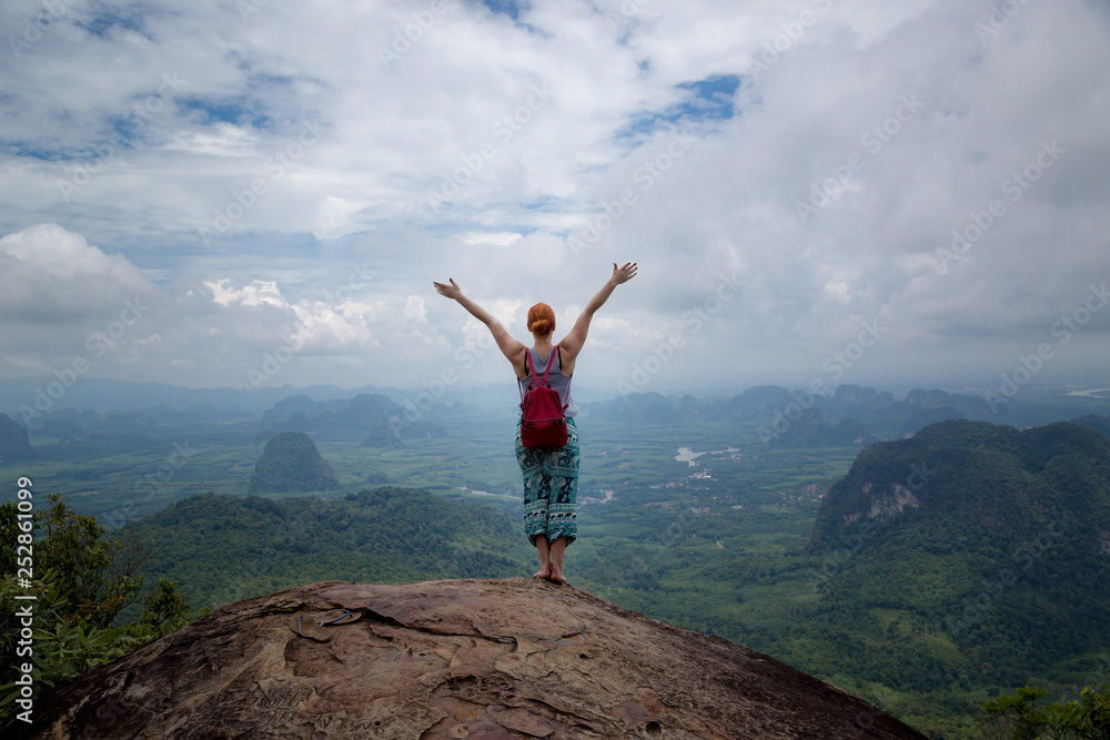 Girl enjoys a beautiful view, Krabi, Thailand Girl enjoys a beautiful view, Krabi, Thailand