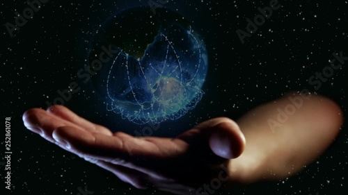 Hand holding Global world telecommunication network connected around planet Earth for internet and worldwide communication technology fabout finance photo