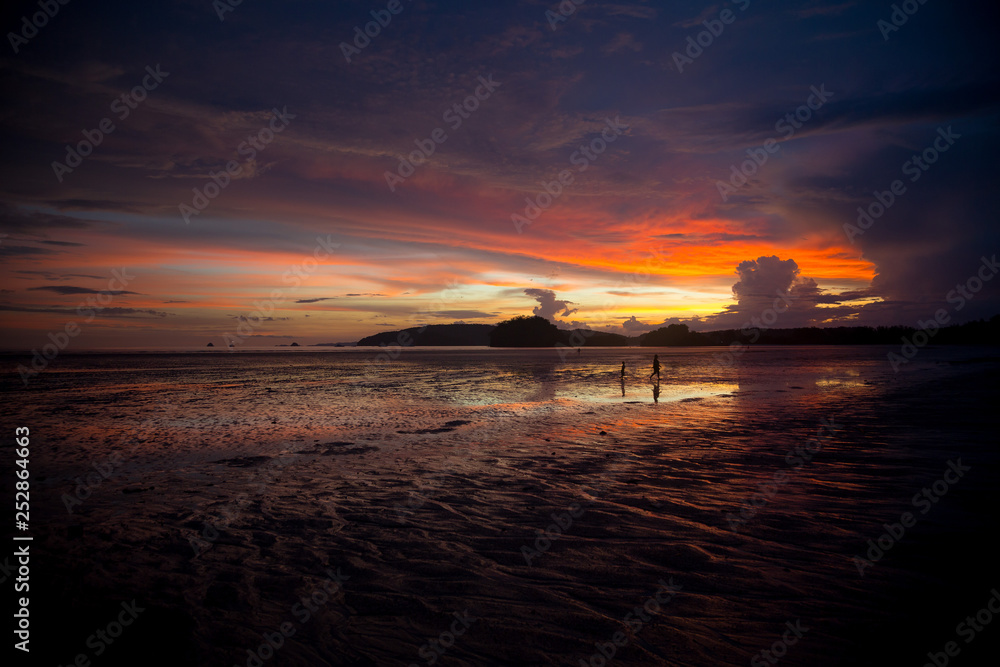 Gloomy tropical sunset,Sunset over Water and Islands,Thailand Gloomy tropical sunset,Sunset over Water and Islands,Thailand