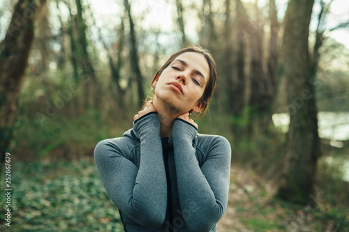Young beautiful woman exercise in the forest