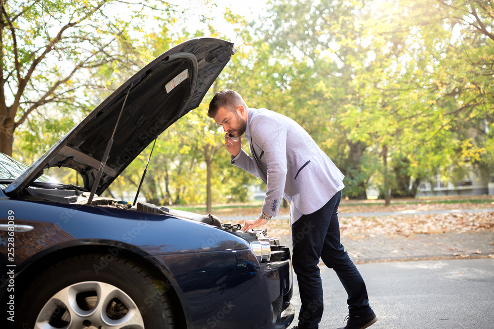 Fancy new car broke down leaving a poor guy stranded on his way to work Fancy new car broke down leaving a poor guy stranded on his way to work